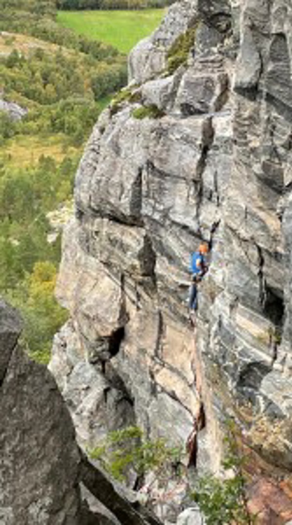 Photo of person climbing outdoors