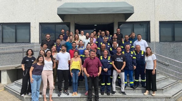 the Joinville team on the stairs outside a building